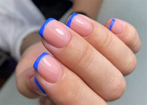 blue french tip manicure.